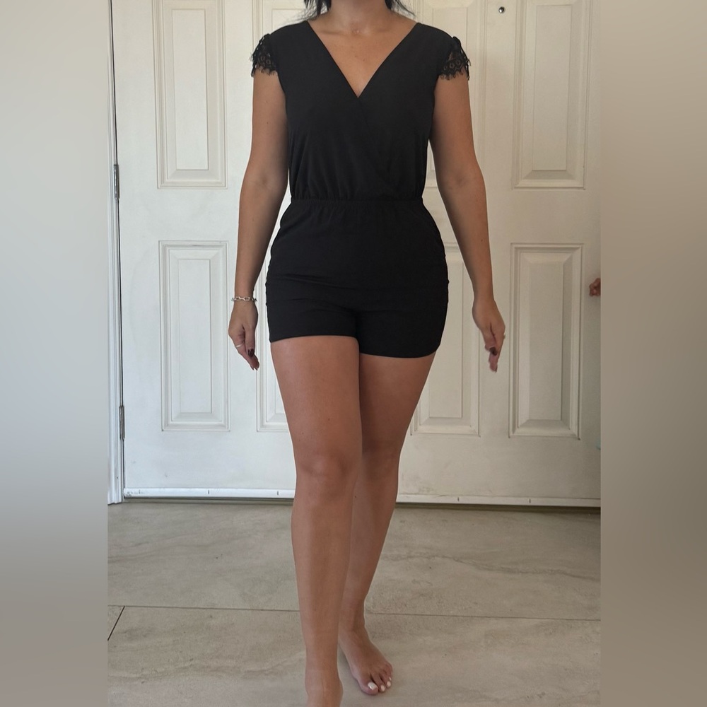 bebe Black Lace Sleeve Romper